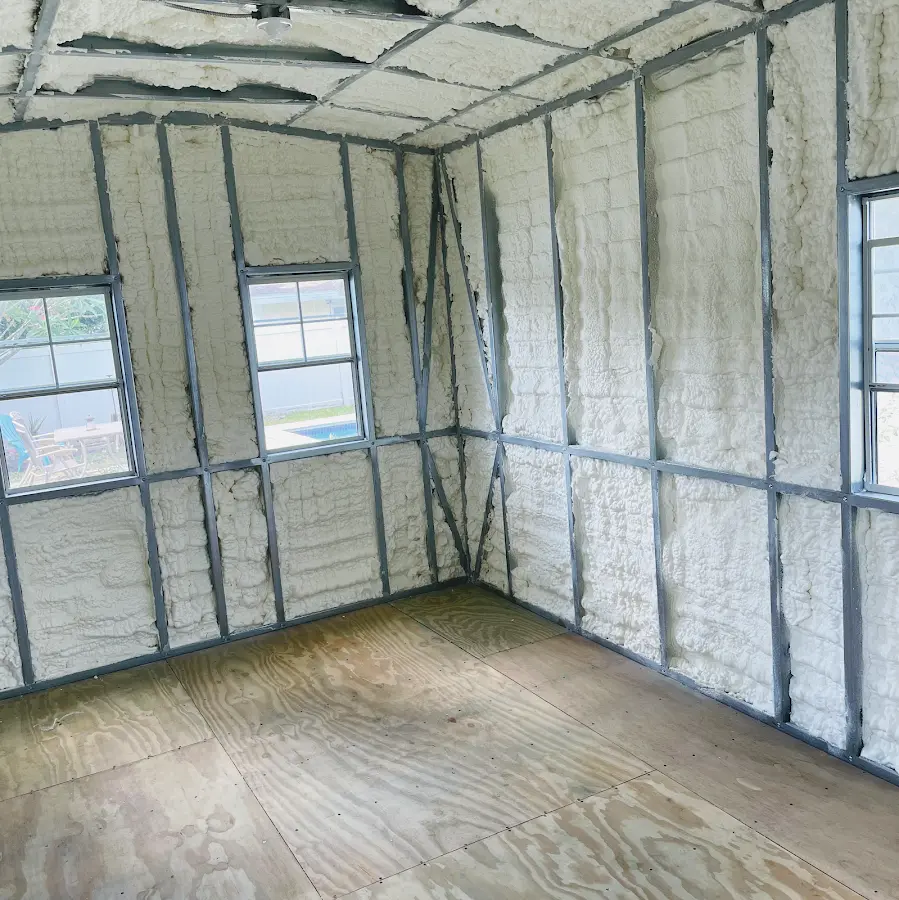 Closed-cell spray foam insulation applied to wall cavities in a residential project in Lakemoor